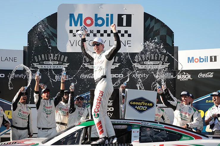 Keselowski celebrating after win