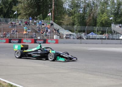 Caio Collet drives at Portland.