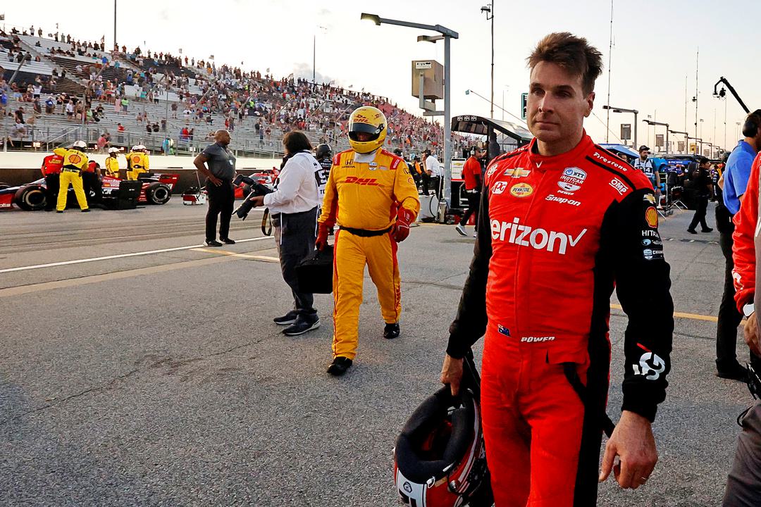 Will Power walks on the grid at World Wide Technology Raceway.