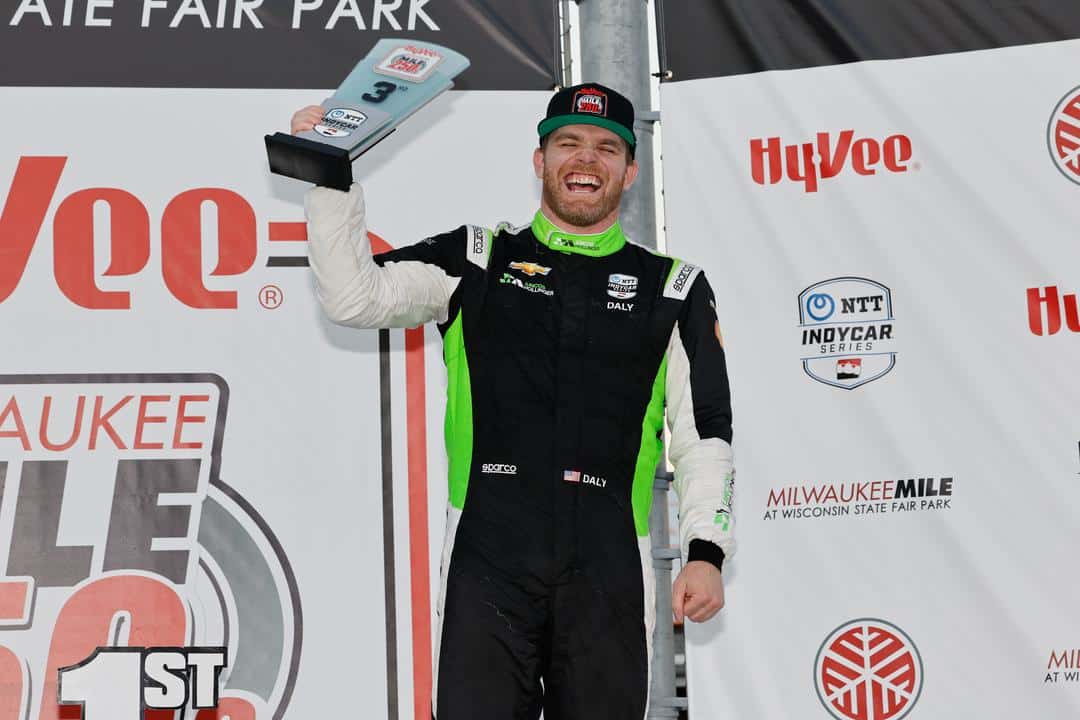 Conor Daly celebrates on the podium at Milwaukee.