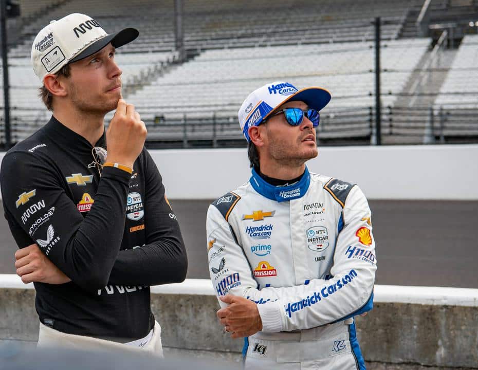 Christian Lundgaard and Kyle Larson look at Indianapolis.