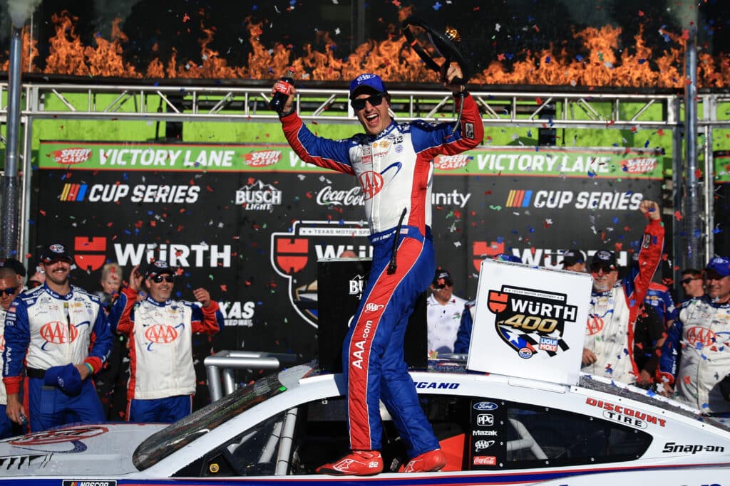 Joey Logano celebrates in Victory Lane at Texas.