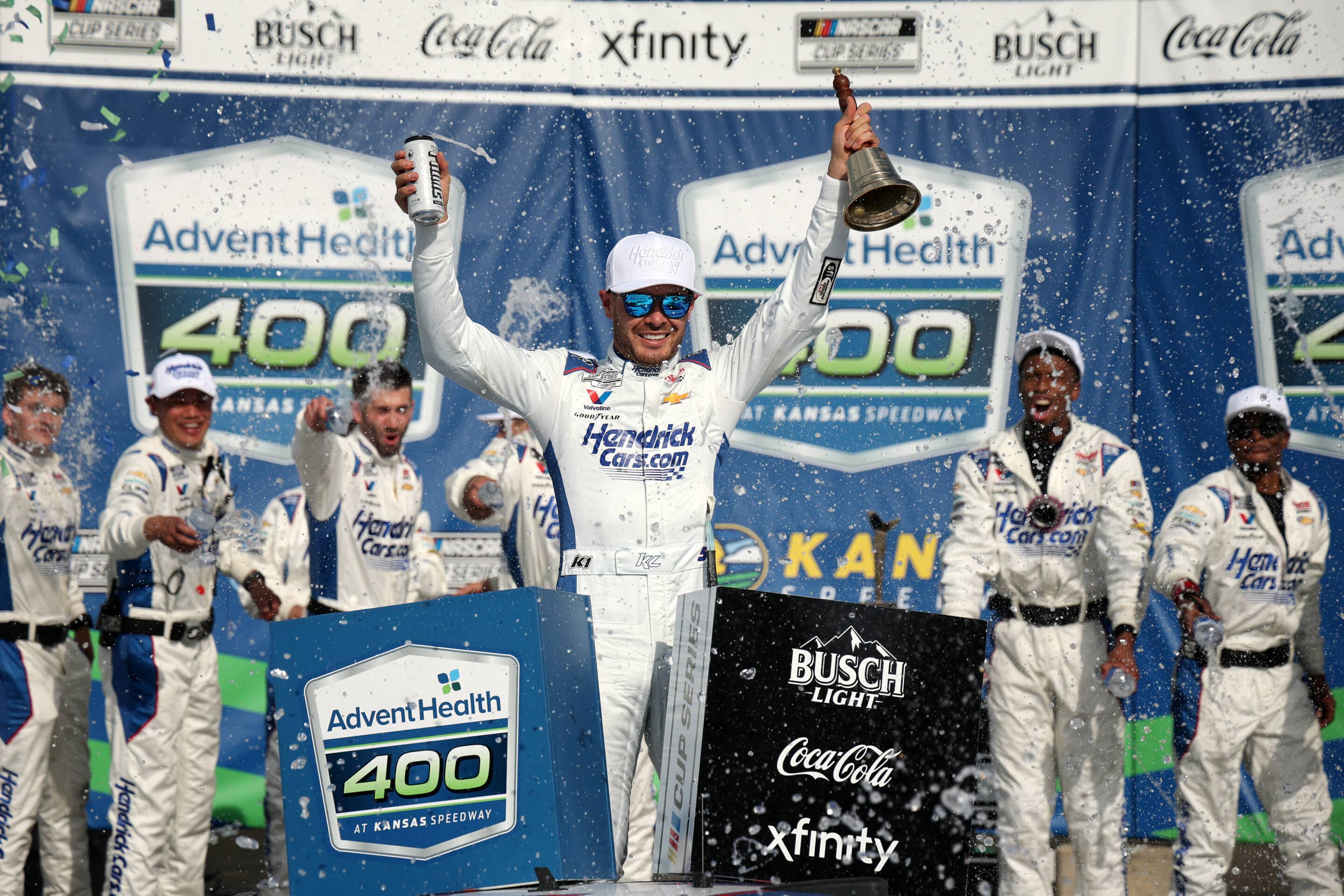 Kyle Larson celebrates in Victory Lane at Kansas.