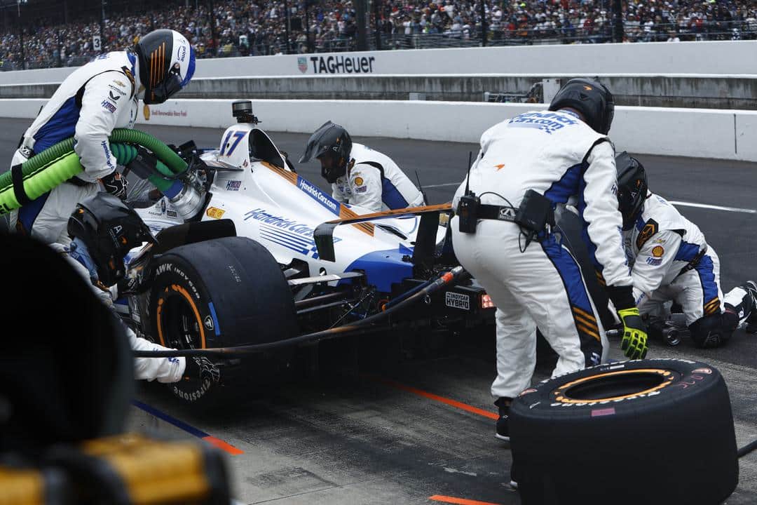 Kyle Larson pits at Indianapolis.