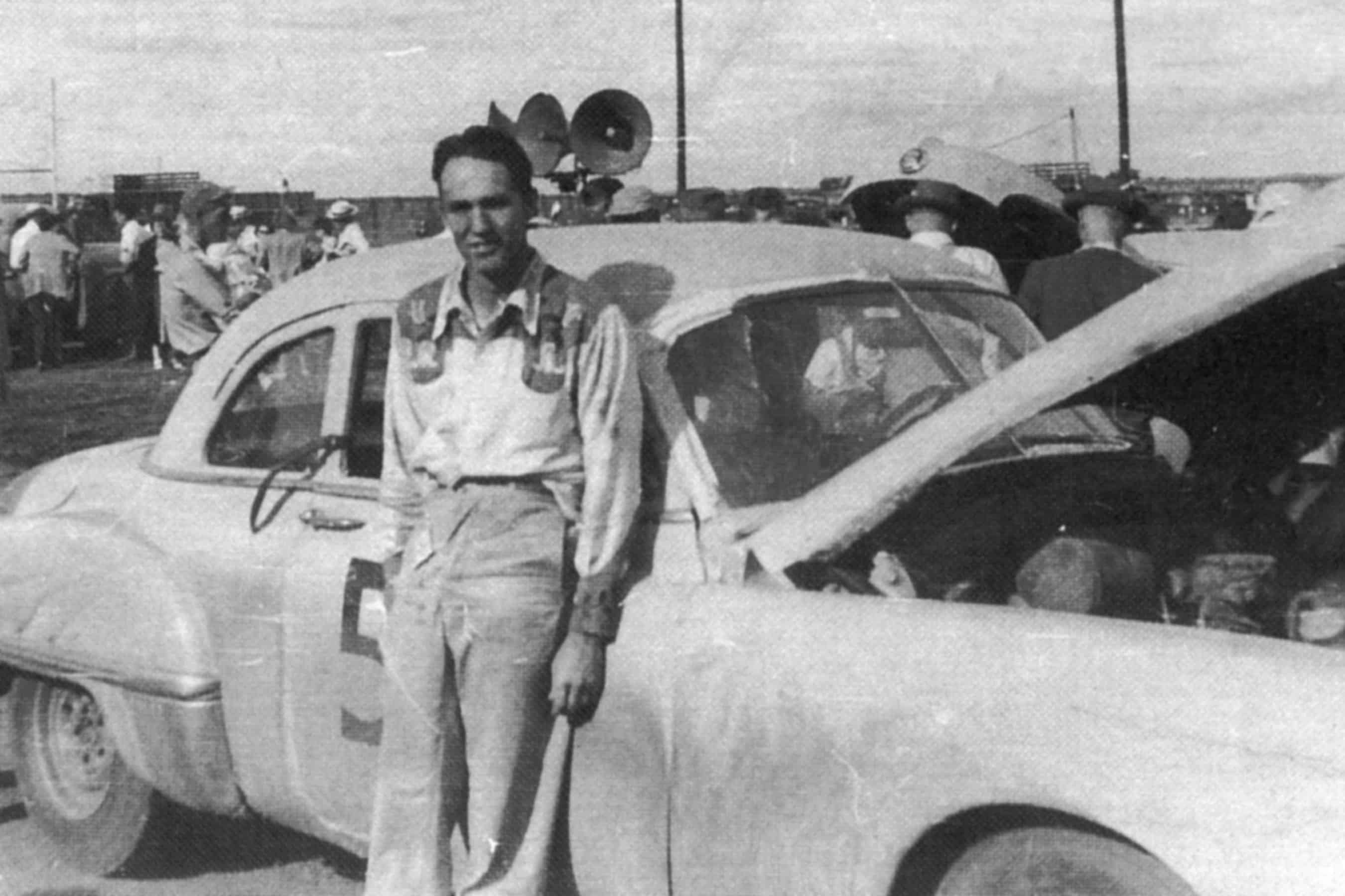 Jim Roper looks on.