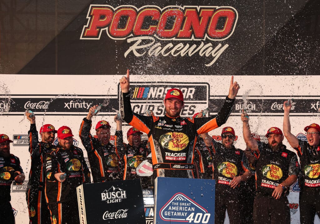 Chase Briscoe celebrates in Victory Lane at Pocono.