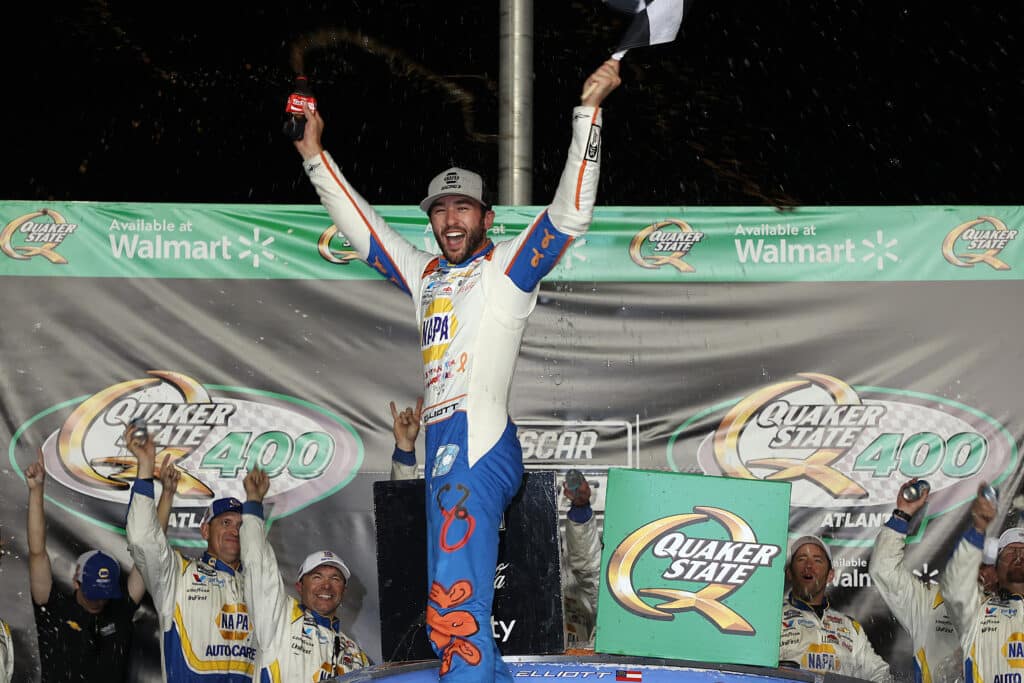 Chase Elliott celebrates in Victory Lane at EchoPark Speedway.