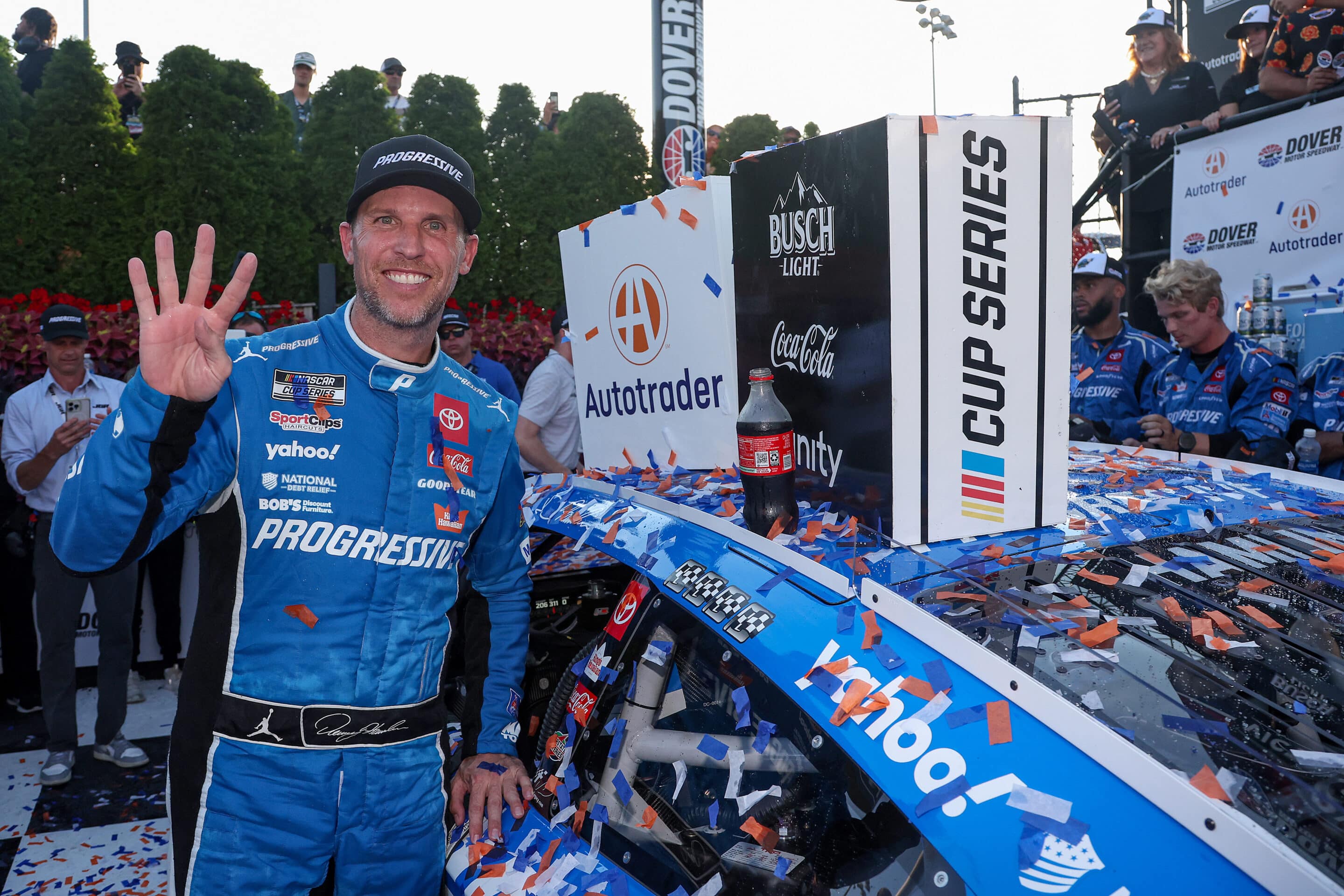 Denny Hamlin celebrates in Victory Lane at Dover.