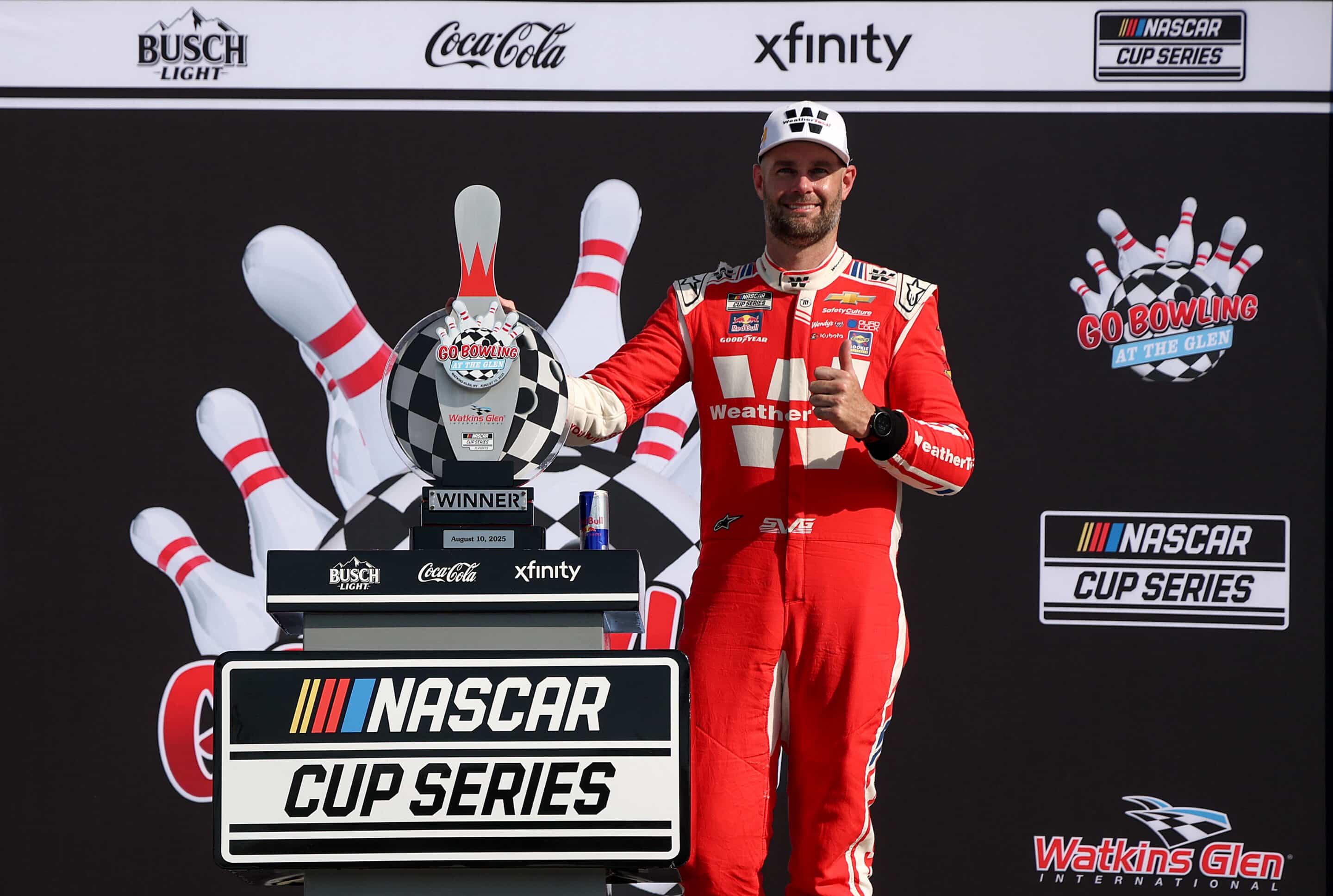 Shane van Gisbergen celebrates in Victory Lane at Watkins Glen.