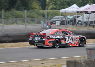 Greg Biffle drives at Portland.