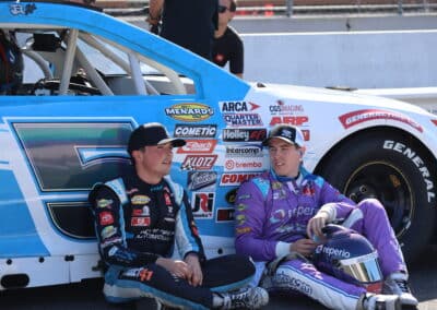 Eric Johnson Jr. sits by his car at Portland.
