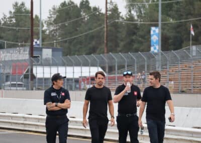 JGR crew members walk at Portland.