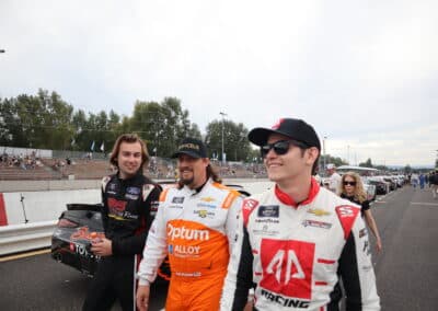 Kyle Sieg, Josh Williams and Vicente Salas walk at Portland.