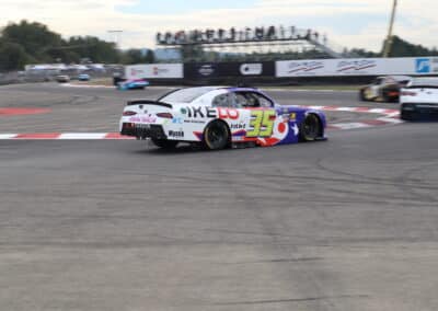 Takuma Koga drives at Portland.