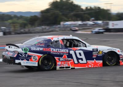 Jack Perkins drives at Portland.