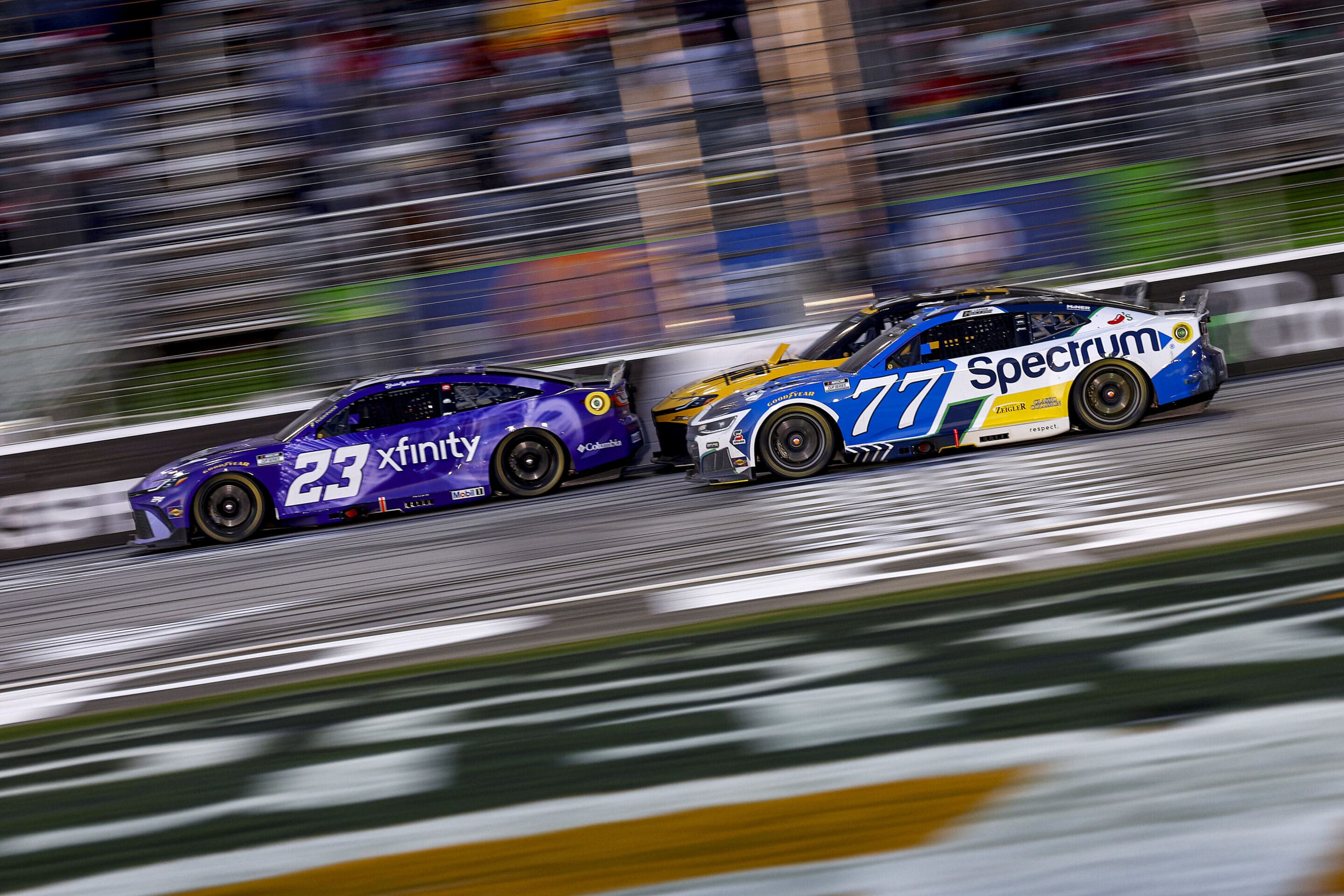 Bubba Wallace and Carson Hocevar race at EchoPark Speedway.