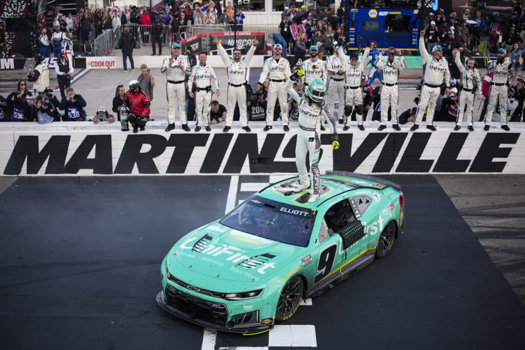 Chase Elliott celebrates after winning at Martinsville.
