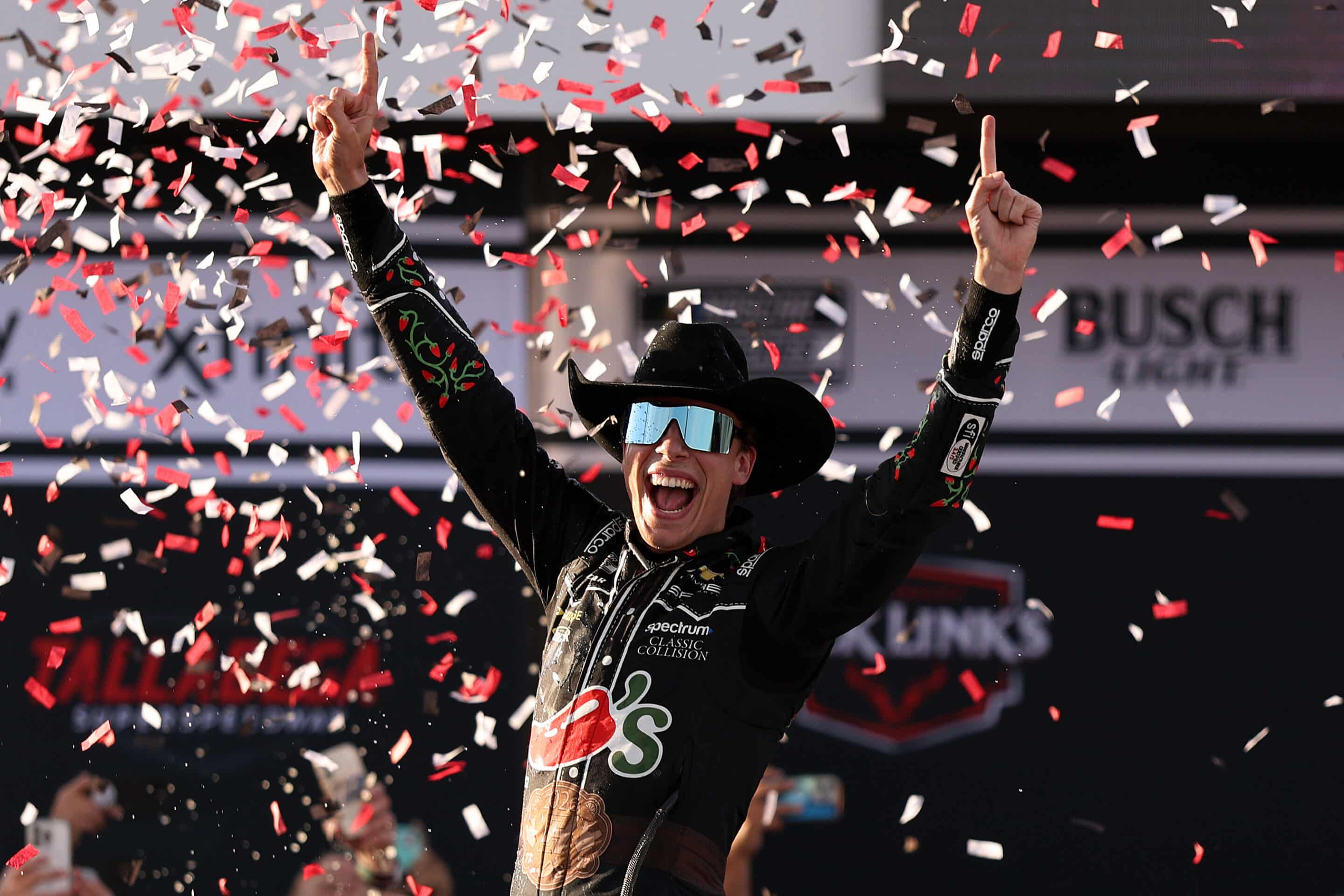 Carson Hocevar celebrates in Victory Lane at Talladega.