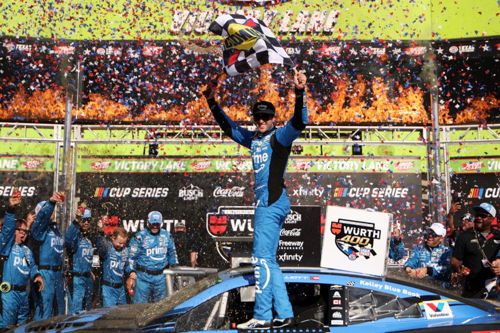 Chase Elliott celebrates in Victory Lane at Texas.
