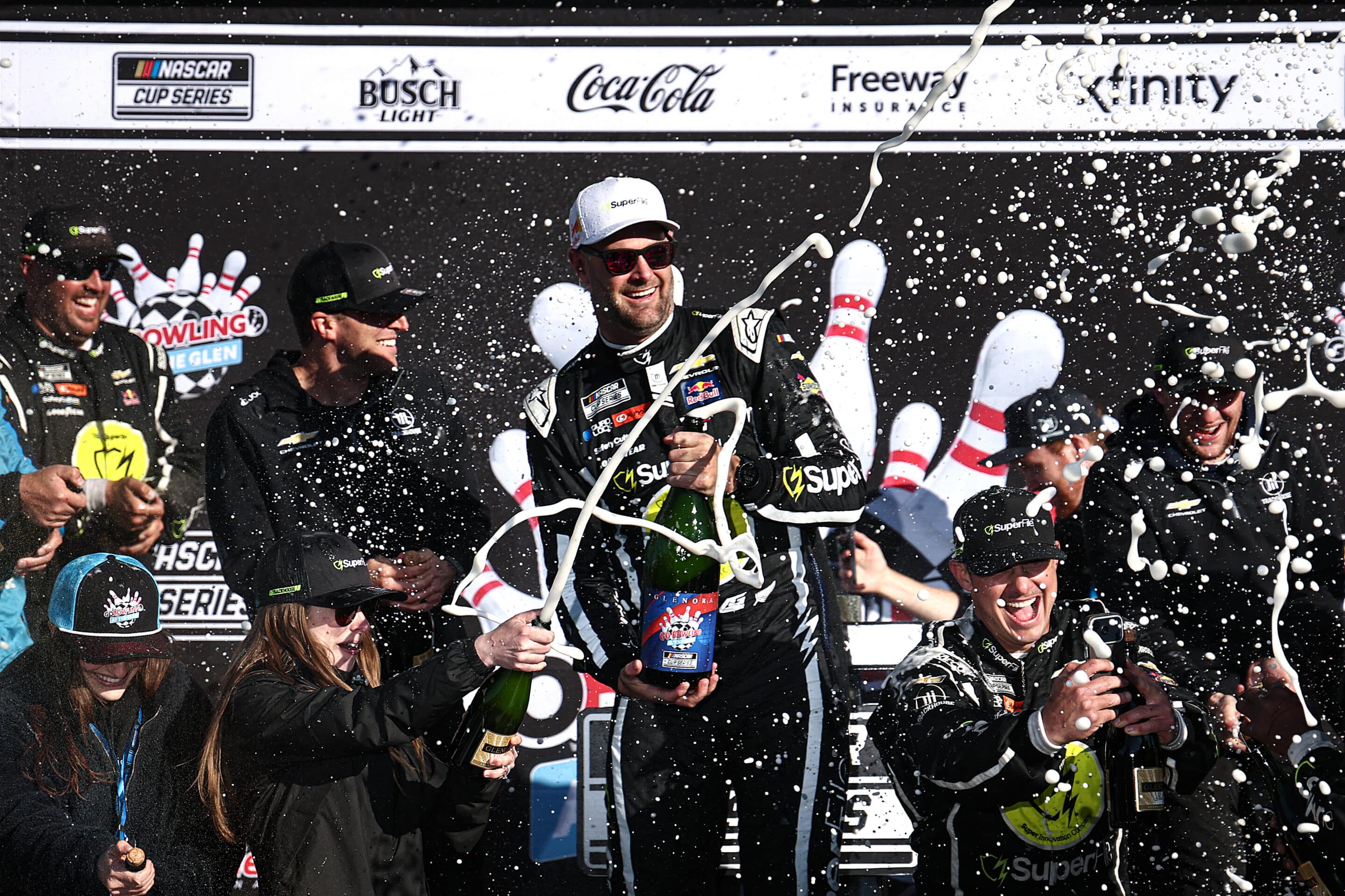 Shane van Gisbergen celebrates in Victory Lane at Watkins Glen.