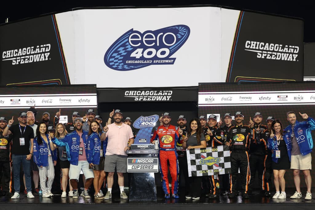 Chase Briscoe celebrates in Victory Lane at Chicagoland.