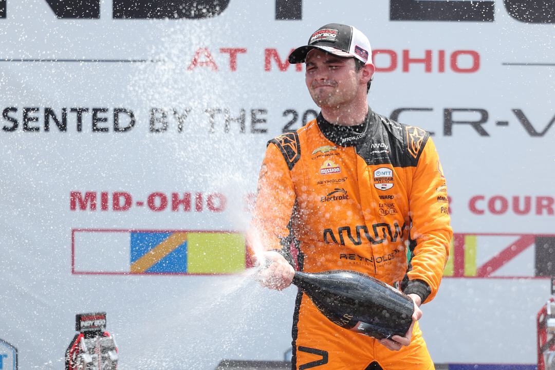 Pato O'Ward celebrates after winning at Mid-Ohio.