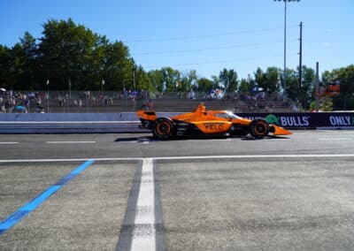 Christian Lundgaard drives down pit road at Portland.