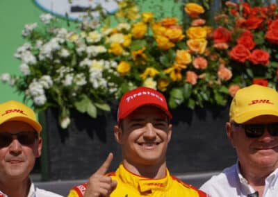 Barry Wanser, Alex Palou and Chip Ganassi celebrate at Portland.
