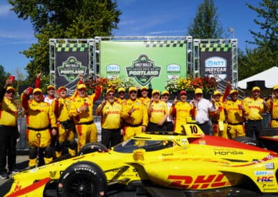 Alex Palou celebrates in Victory Lane at Portland.