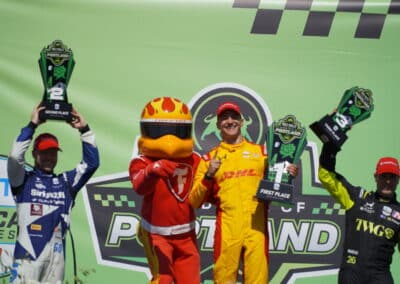 The podium finishers celebrate at Portland.