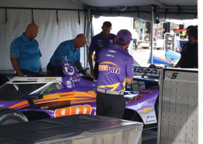 Rinus VeeKay's car rolls through technical inspection at Portland.