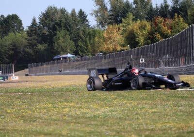 Jacob Abel drives at Portland.