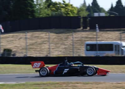 Myles Rowe drives at Portland.