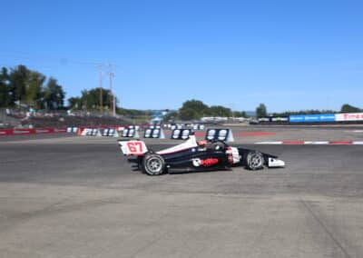 Enzo Fittipaldi drives at Portland.