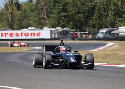 Jacob Abel drives at Portland.