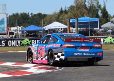 Trevor Huddleston drives at Portland.