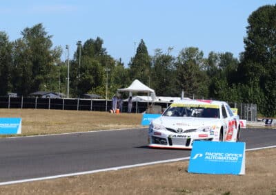 Sam Corry drives at Portland.