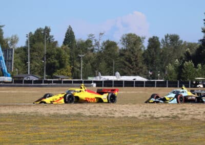 Alex Palou and Alexander Rossi drive at Portland.