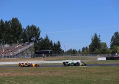 Marcus Armstrong and Pato O'Ward drive at Portland.