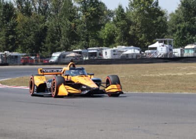 Pato O'Ward drives at Portland.