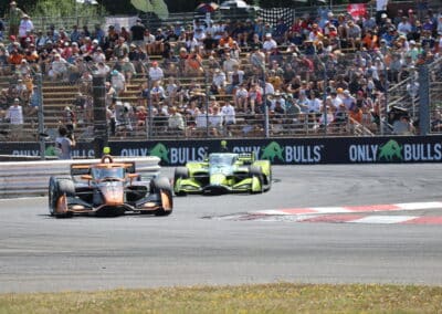 Romain Grosjean and Christian Rasmussen drive at Portland.
