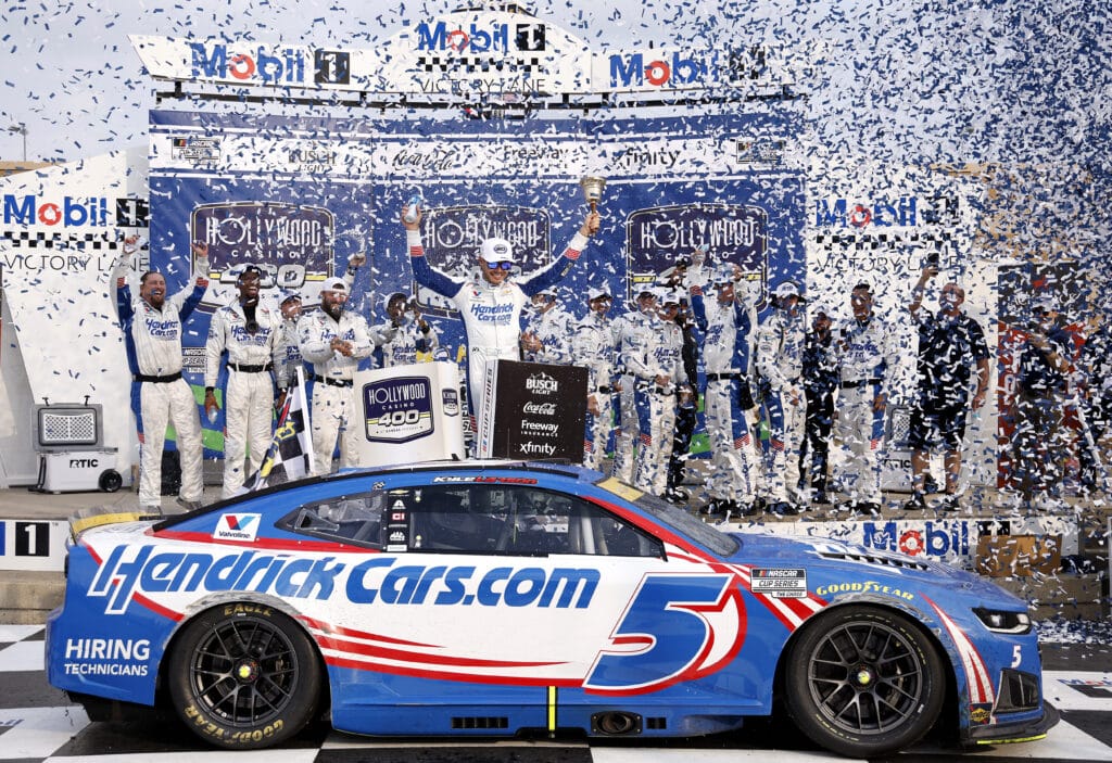 Kyle Larson celebrates in Victory Lane at Kansas.