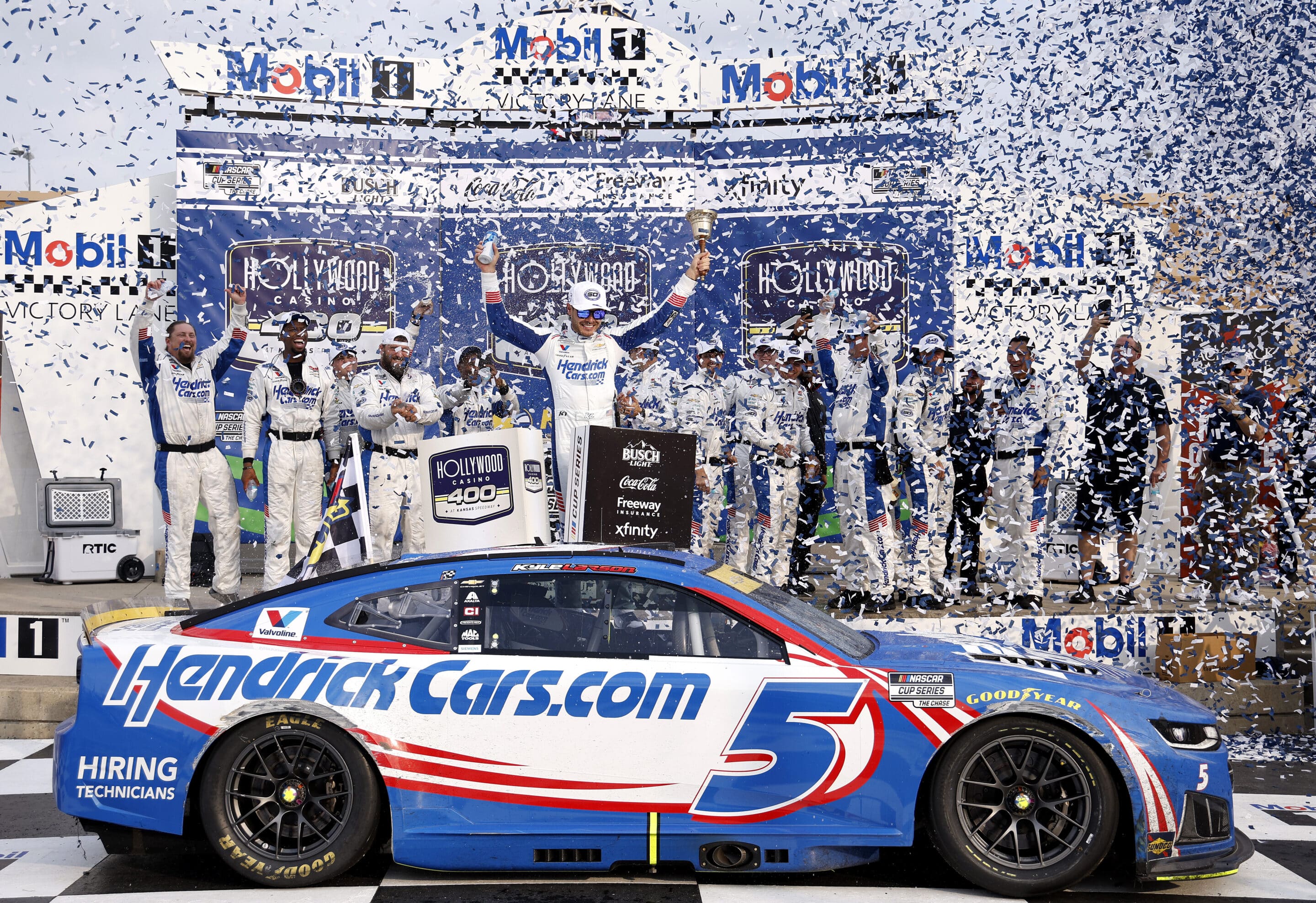 Kyle Larson celebrates in Victory Lane at Kansas.