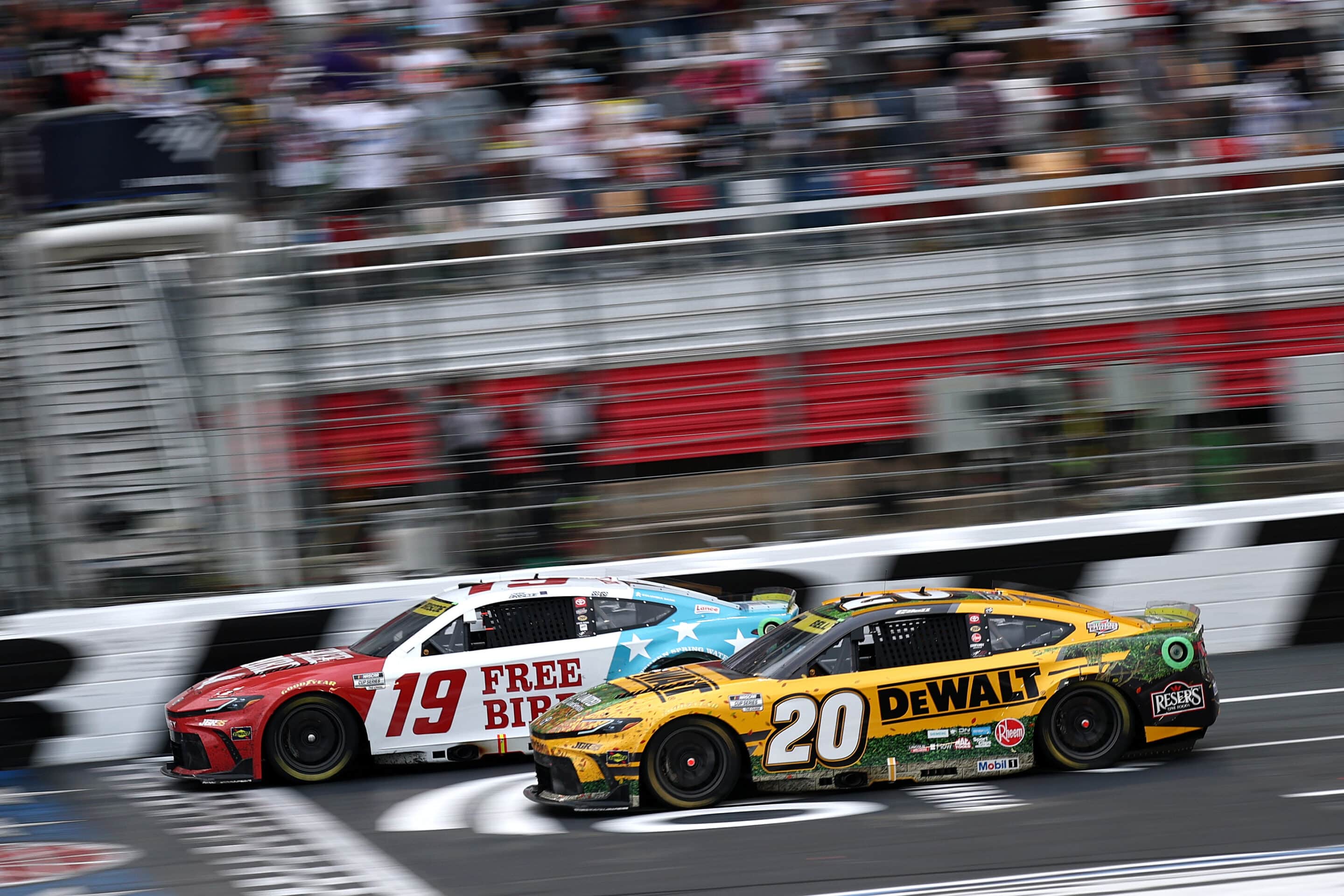 Chase Briscoe beats Christopher Bell to win at Charlotte.