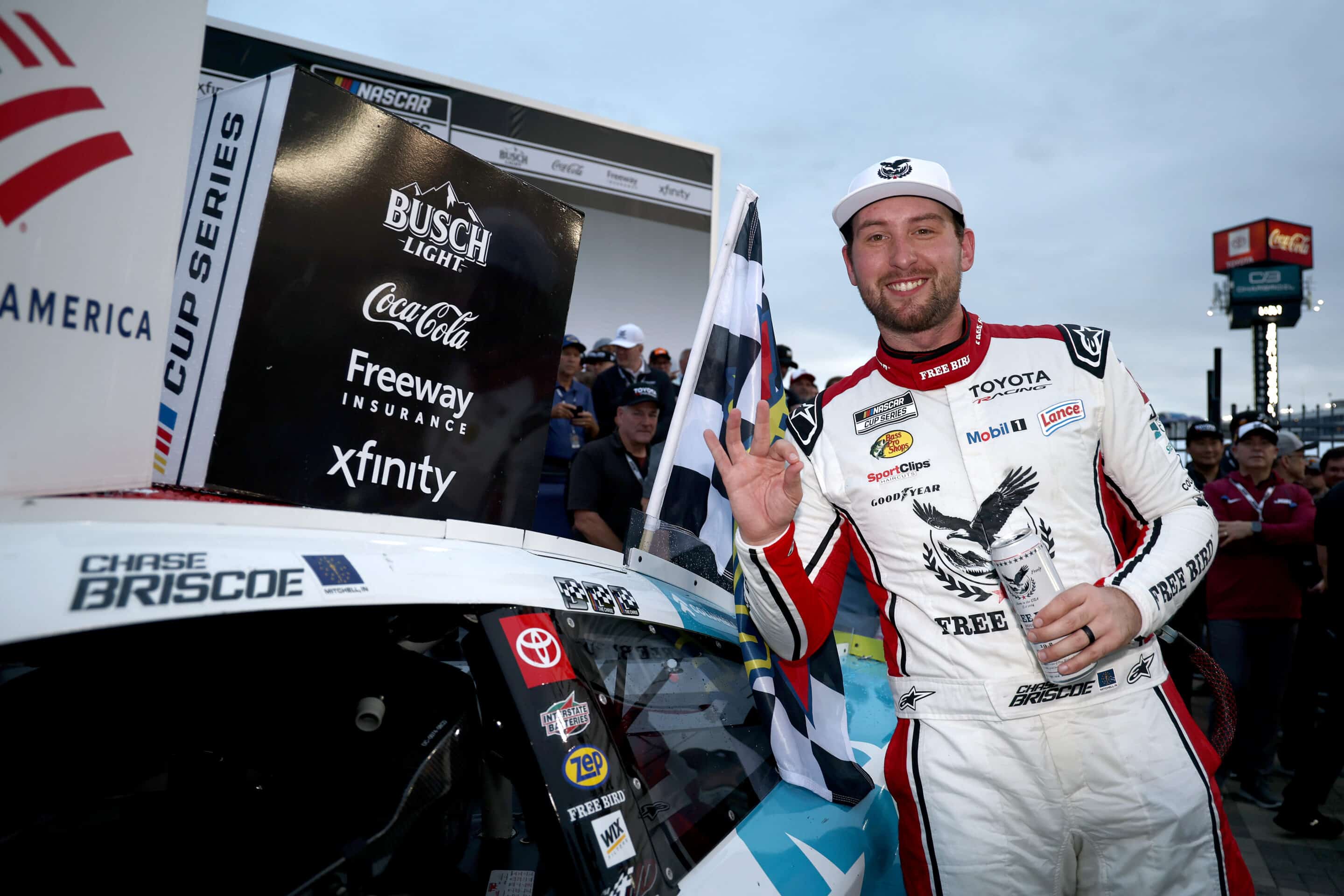 Chase Briscoe celebrates in Victory Lane at Charlotte.